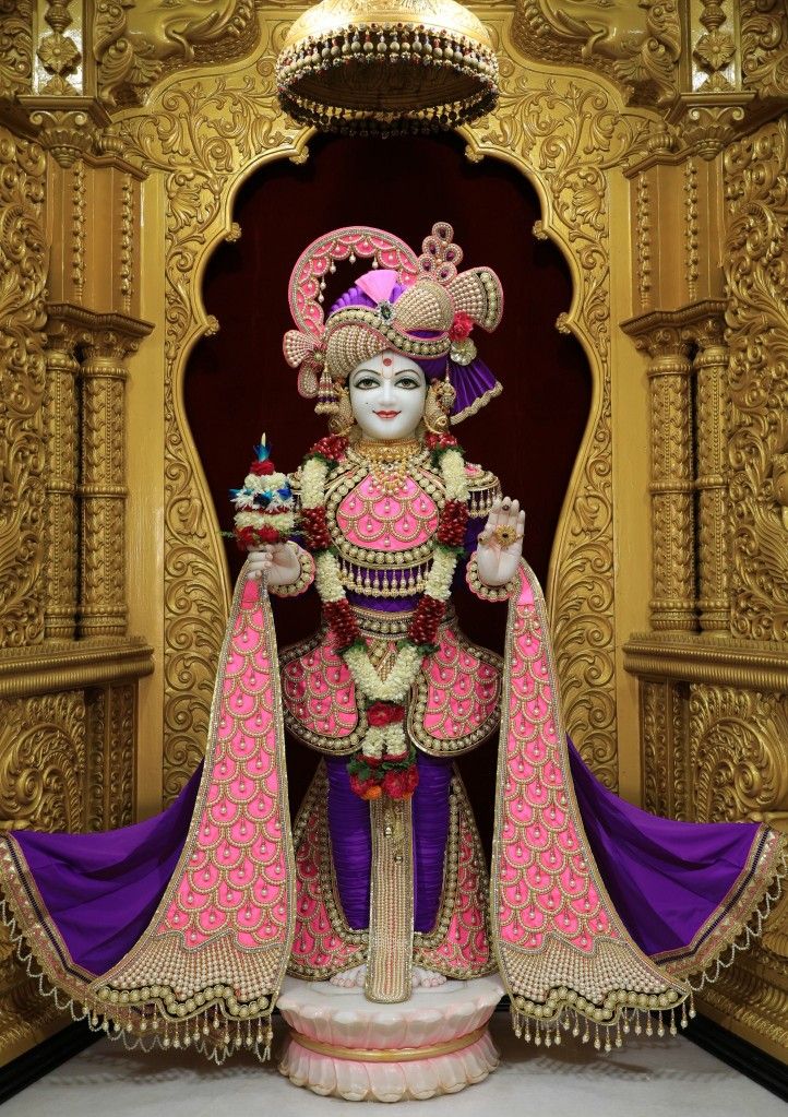 Swaminarayan murti in ornate temple setting