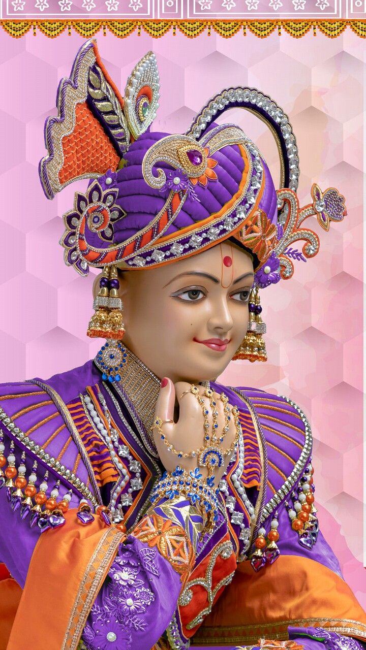 Swaminarayan with ornate headwear and jewelry