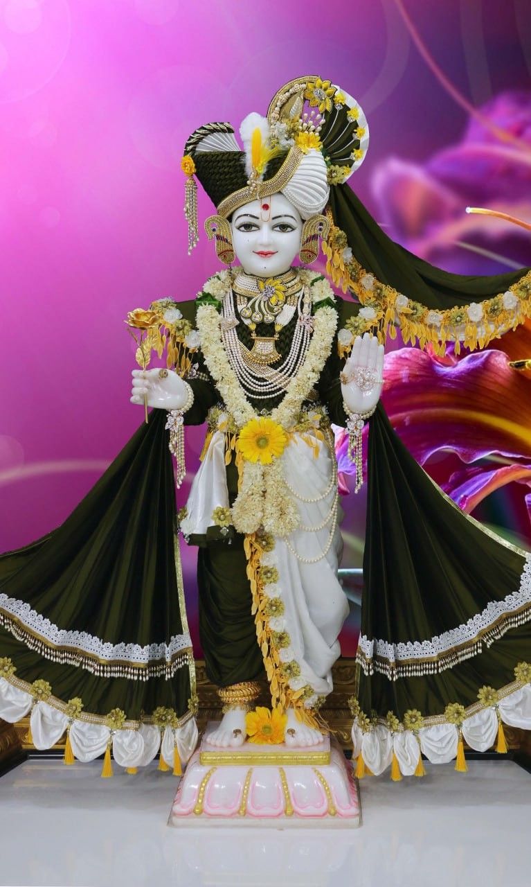 Swaminarayan deity in ornate attire.