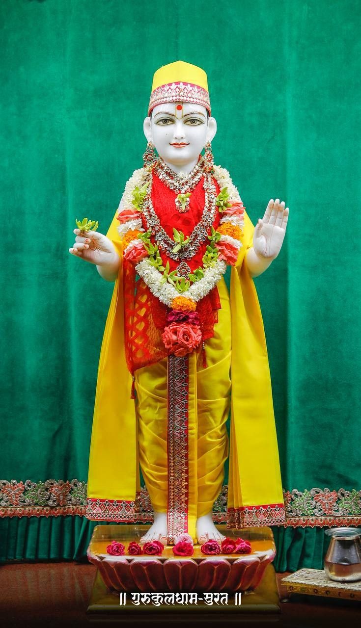 Swaminarayan deity in vibrant attire