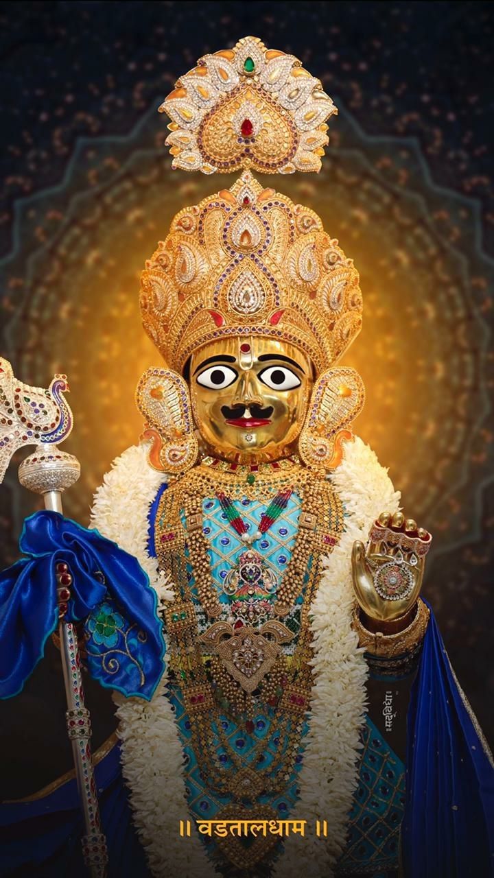 Swaminarayan deity with golden crown