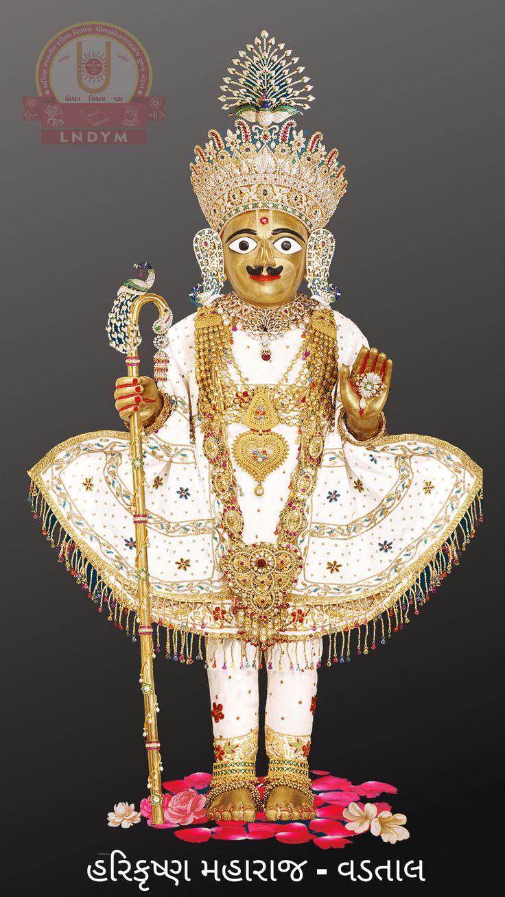 Golden Swaminarayan statue with floral base