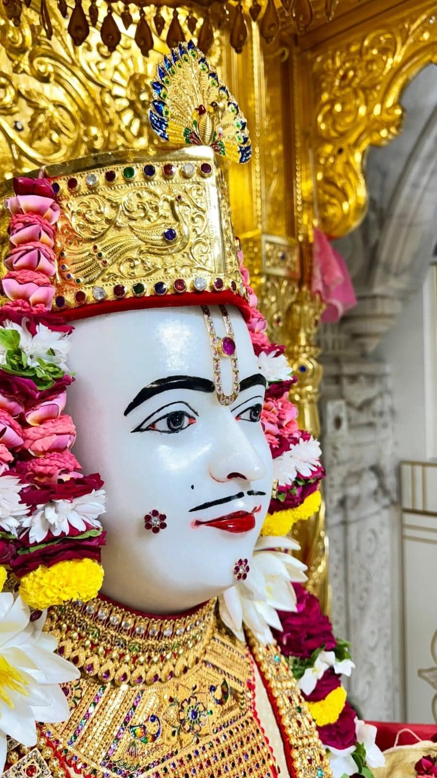 Swaminarayan Bhagwan with flower crown