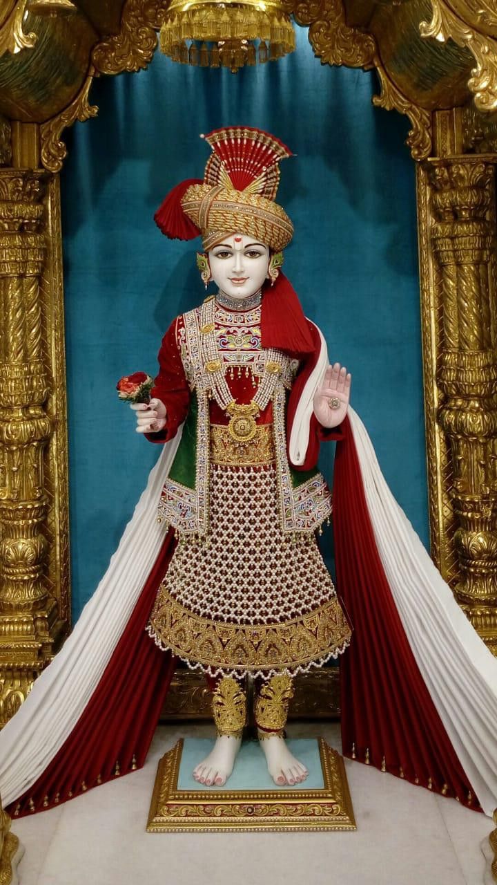 Swaminarayan in ornate golden attire
