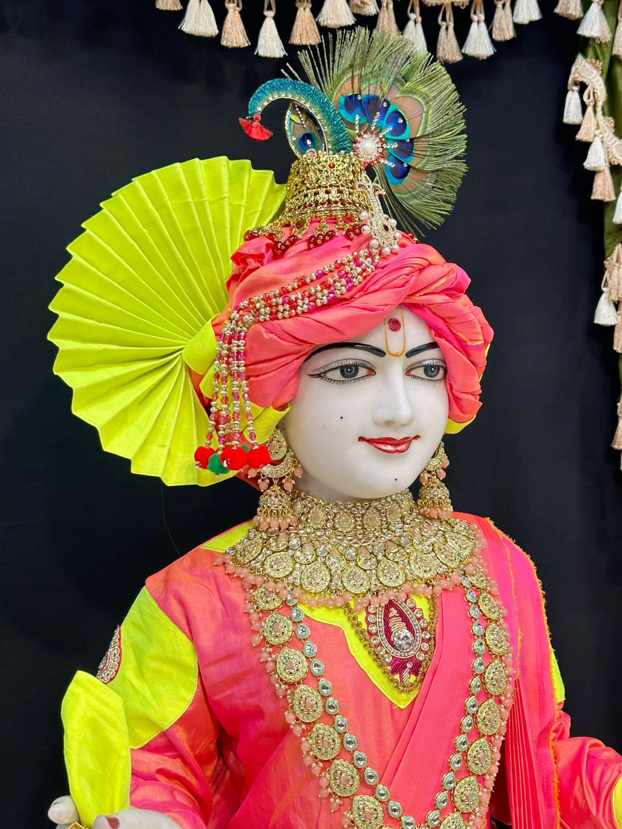 Swaminarayan Bhagwan with peacock feather crown