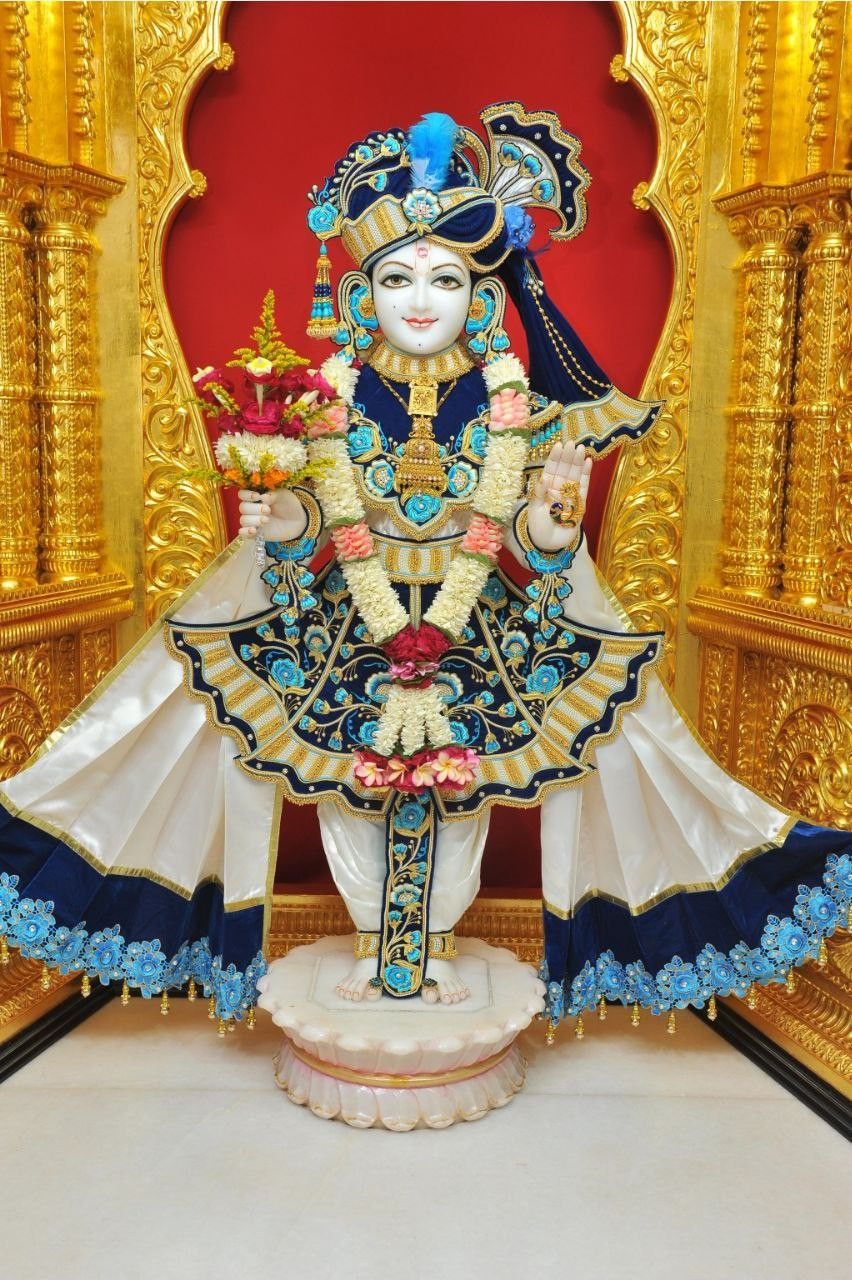 Swaminarayan idol with floral garland