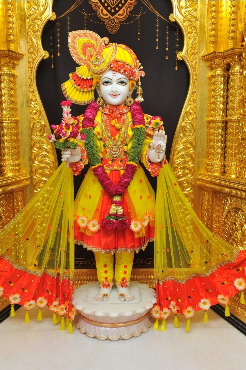 Swaminarayan Bhagwan in ornate temple setting
