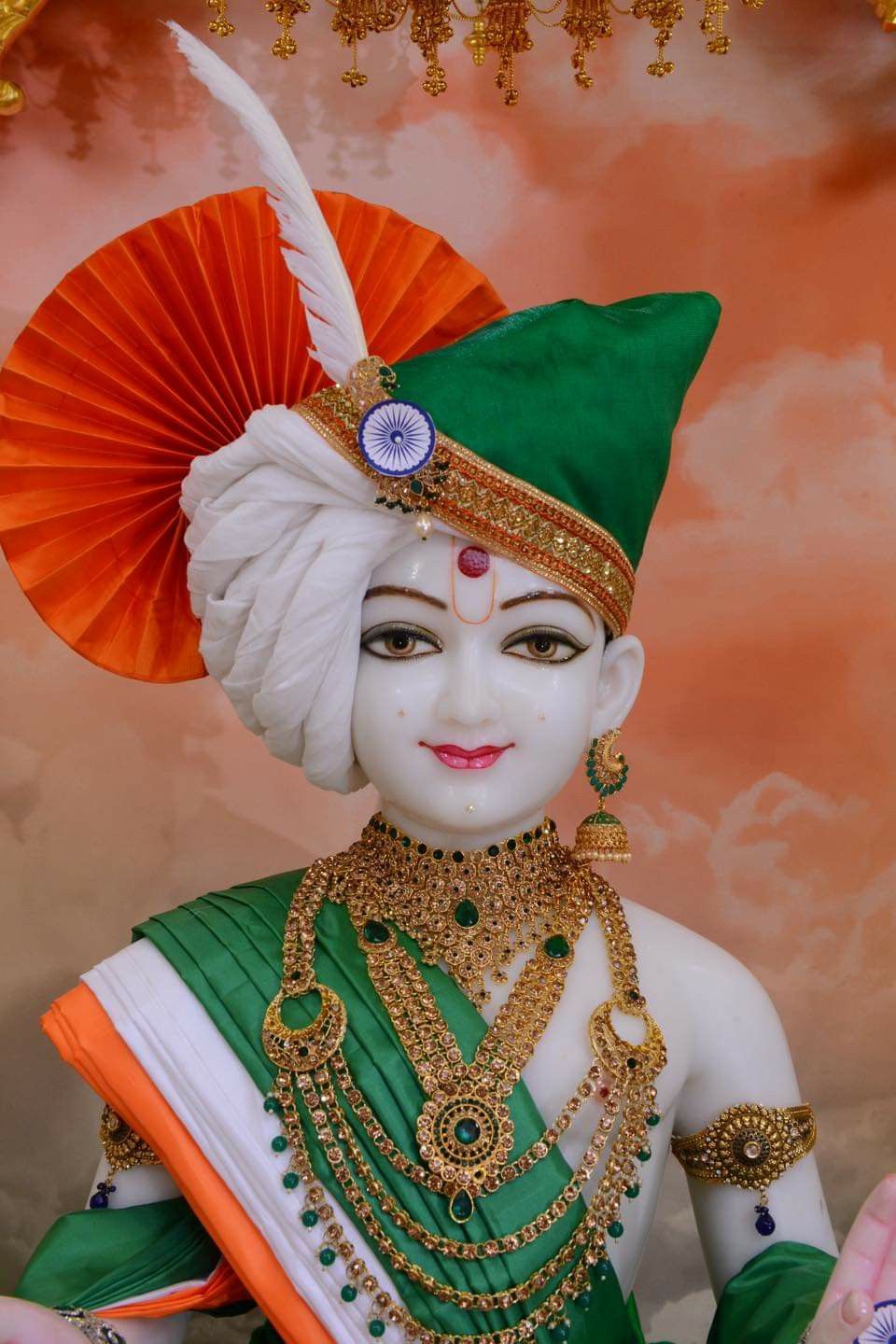 Swaminarayan idol with gold ornaments