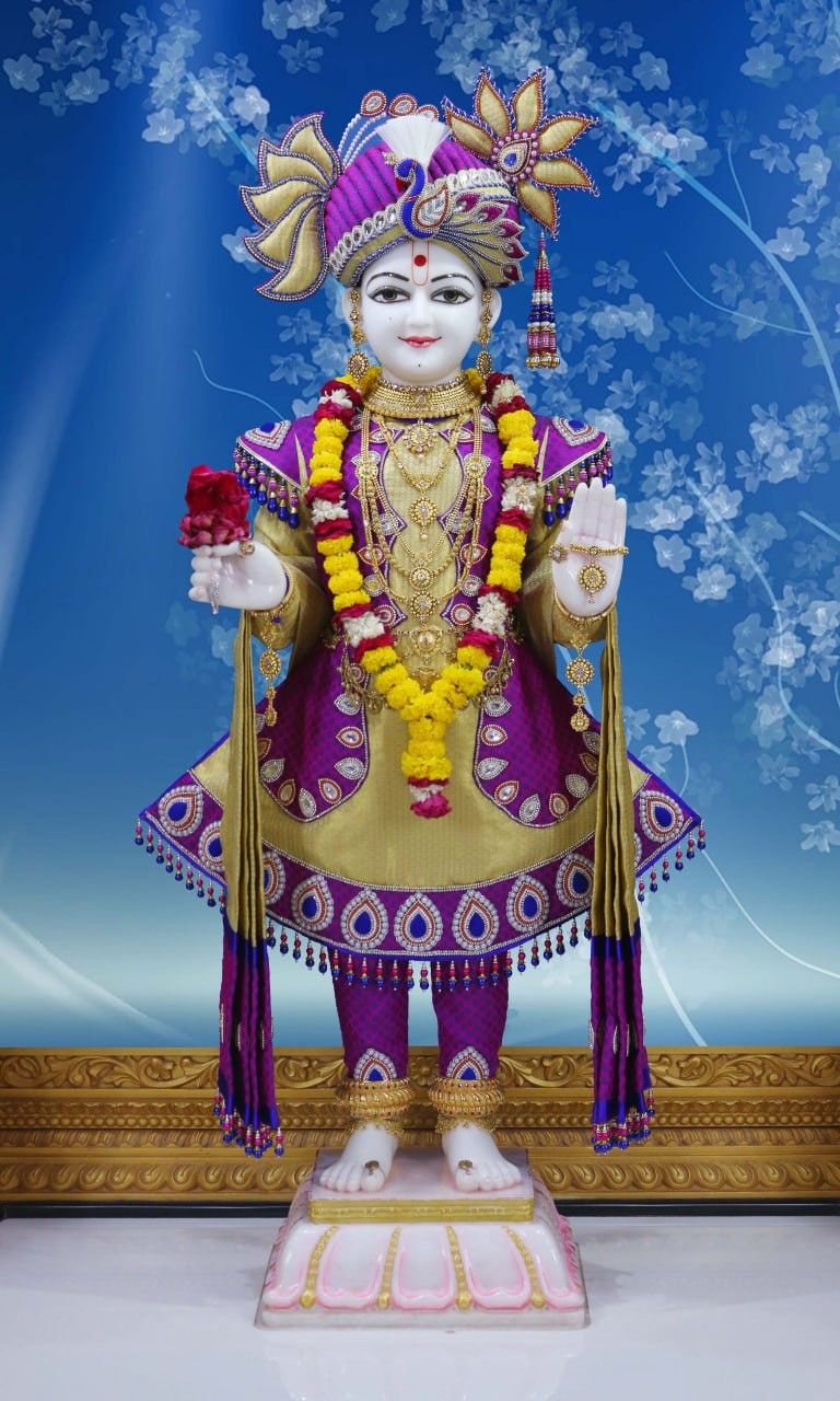 Swaminarayan deity in ornate attire