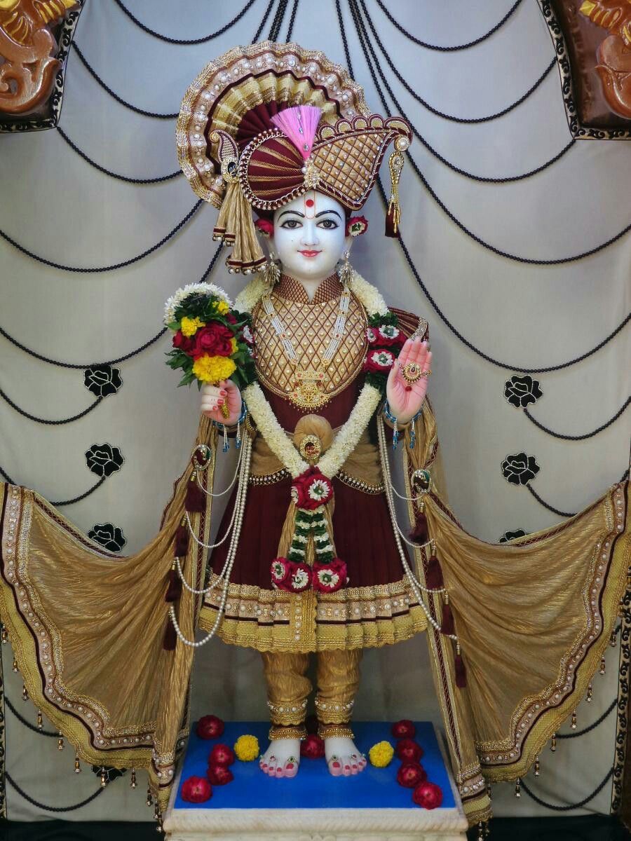 Swaminarayan deity in ornate attire