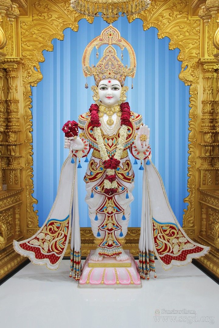 Swaminarayan deity in a temple setting