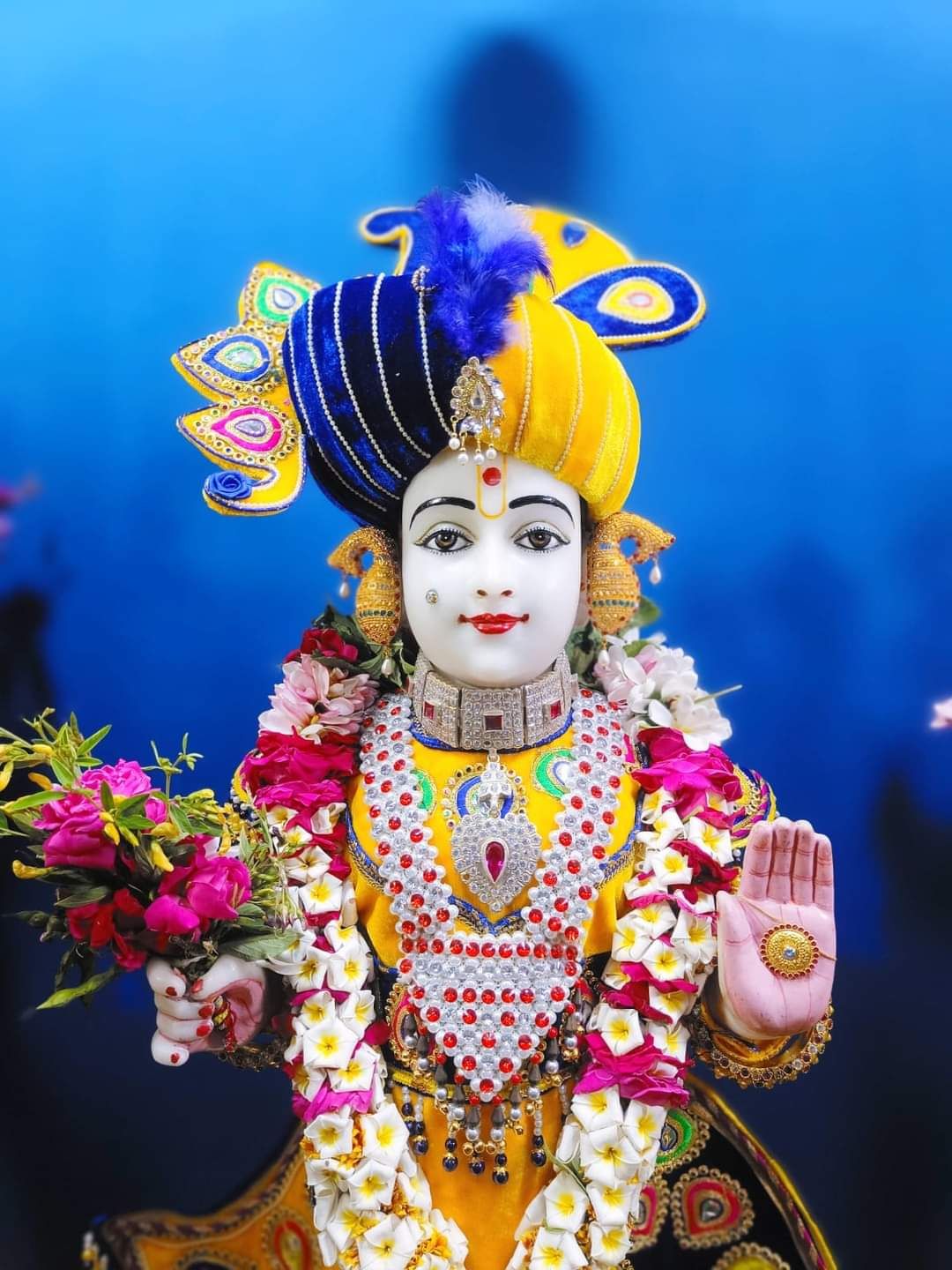 Swaminarayan with floral adornments