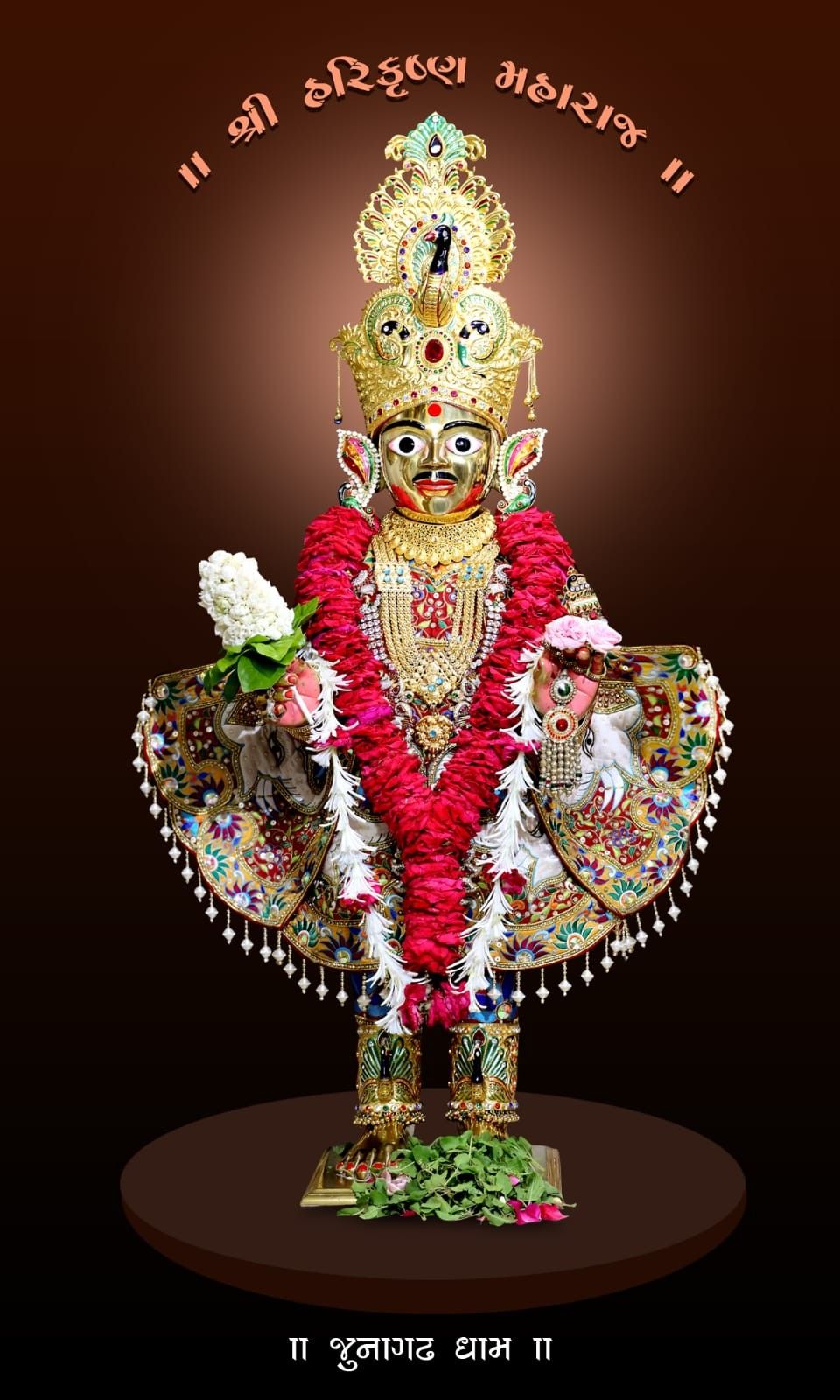 Swaminarayan deity adorned with floral garland