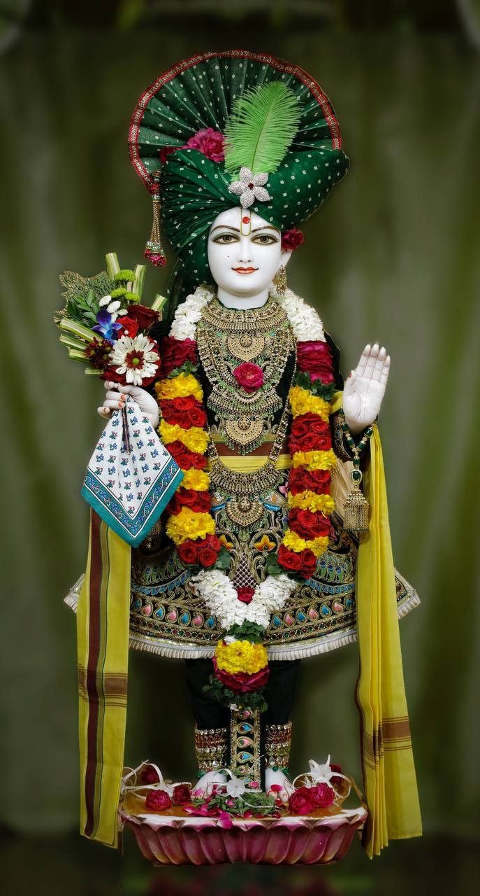 Swaminarayan deity with floral garland