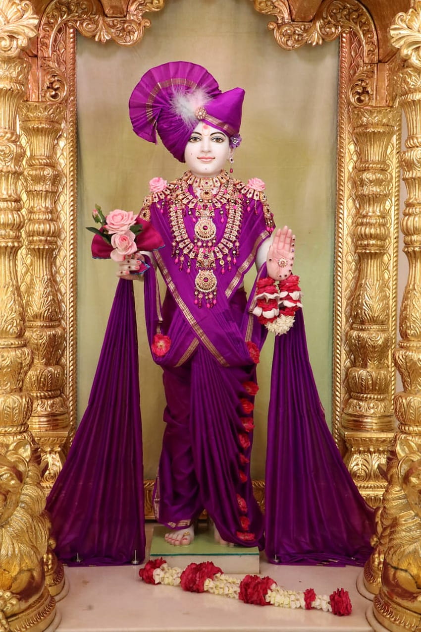 Swaminarayan Bhagwan in purple attire