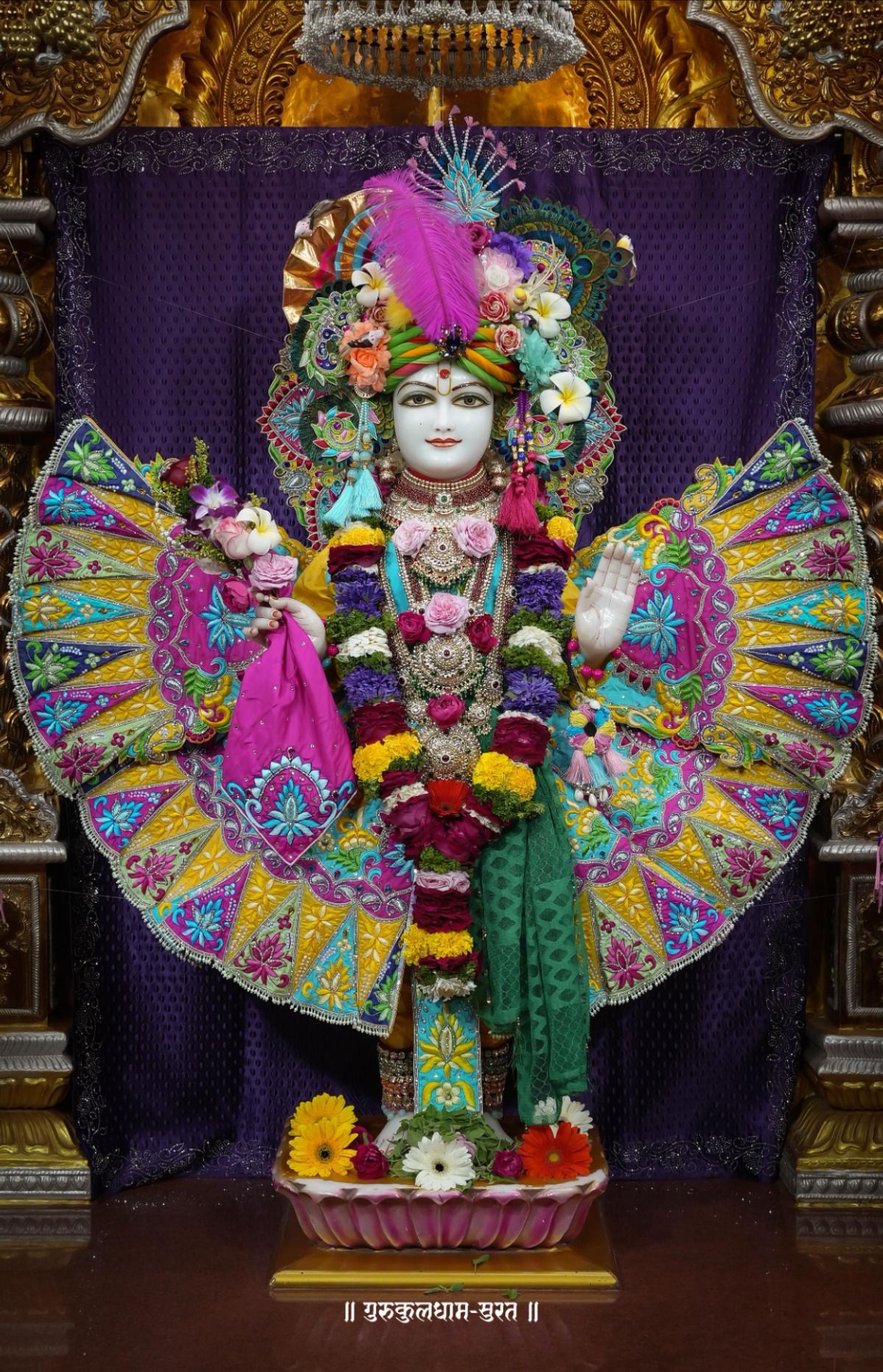 Swaminarayan Maharaj in ornate floral attire