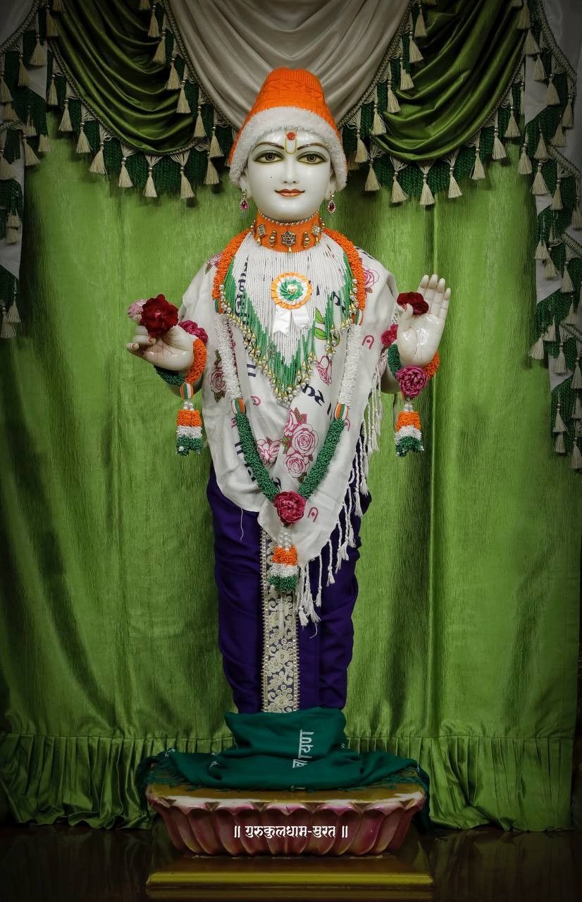 Swaminarayan idol with floral decorations