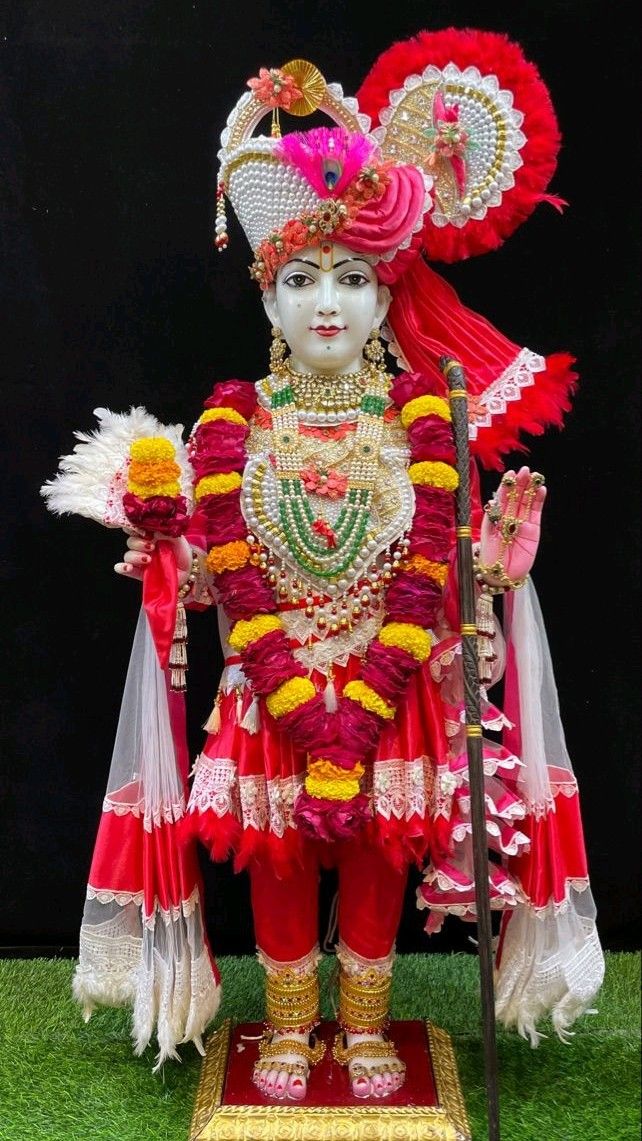 Swaminarayan adorned in floral garlands