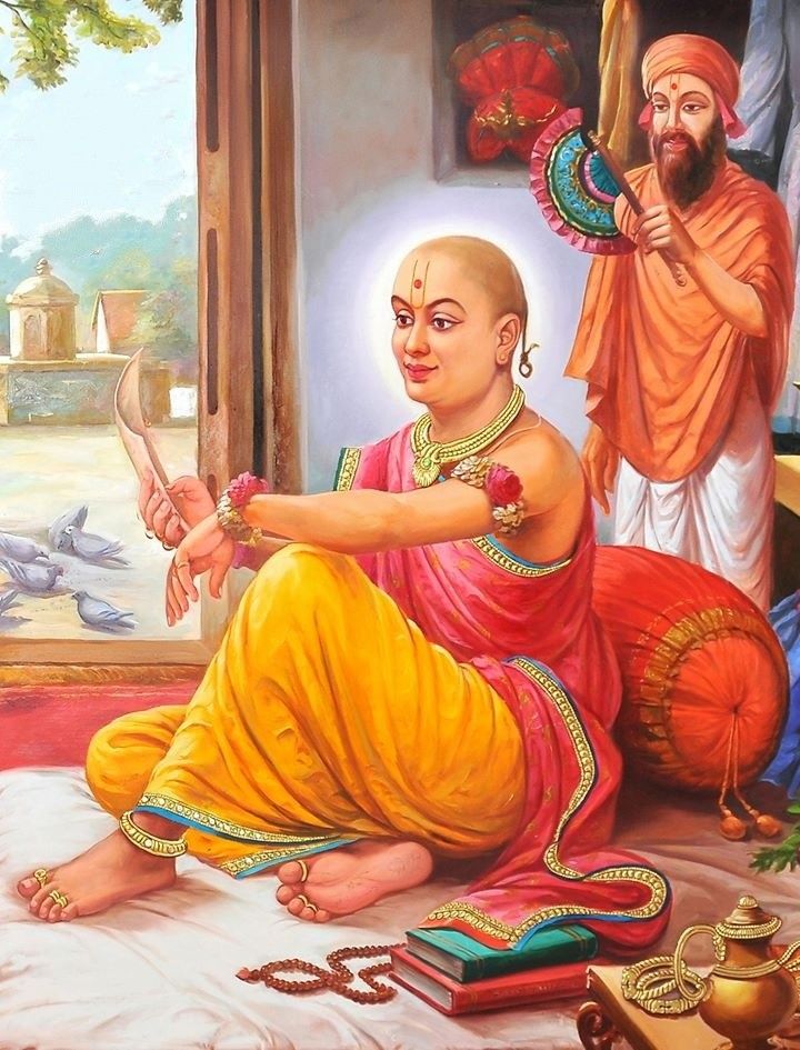 Swaminarayan seated with scriptures and saint