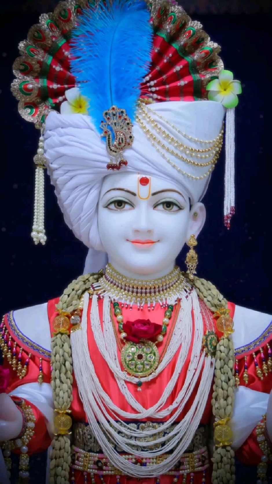 Swaminarayan with ornate turban and jewelry