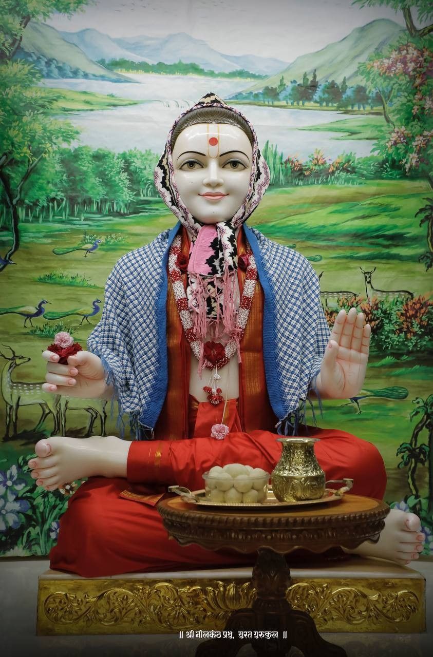 Swaminarayan statue with lotus offering