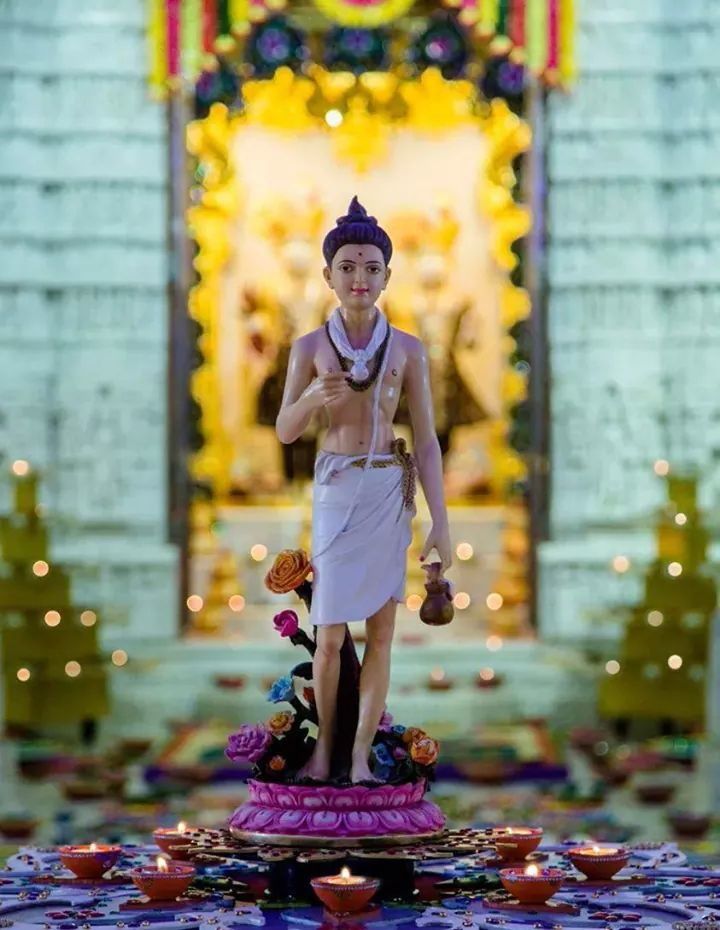 Swaminarayan statue in peaceful temple setting