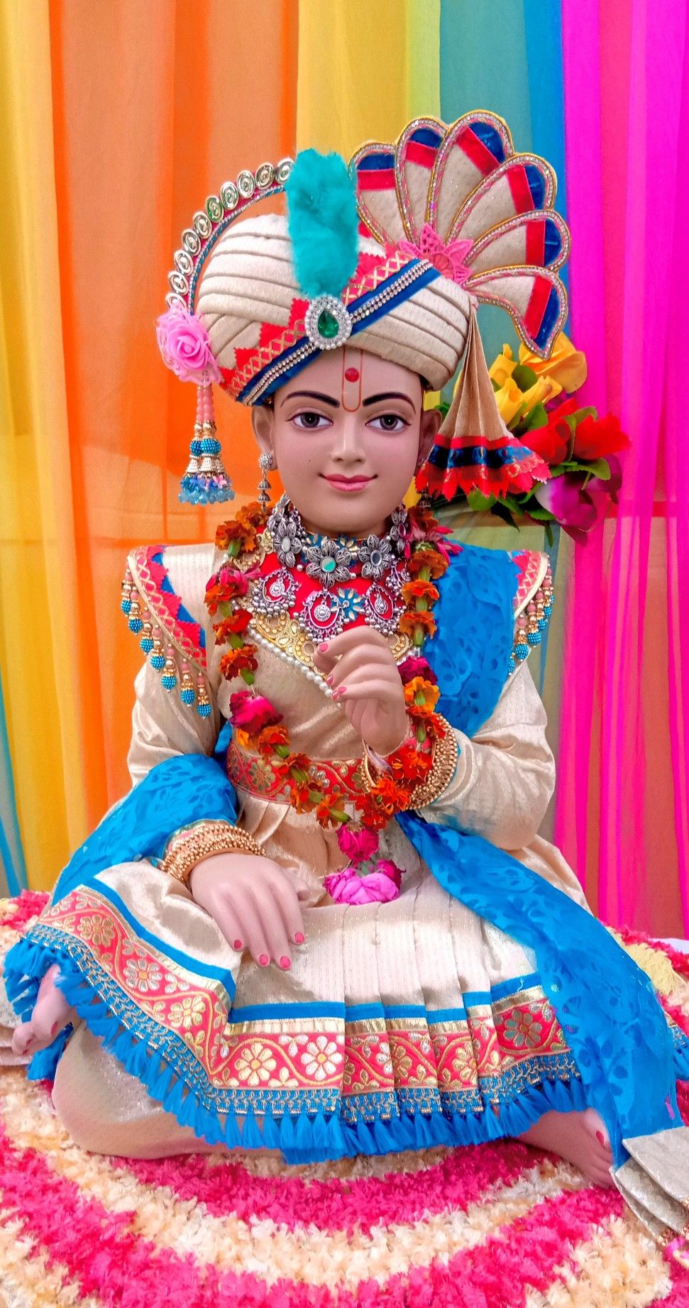 Swaminarayan deity with ornate crown