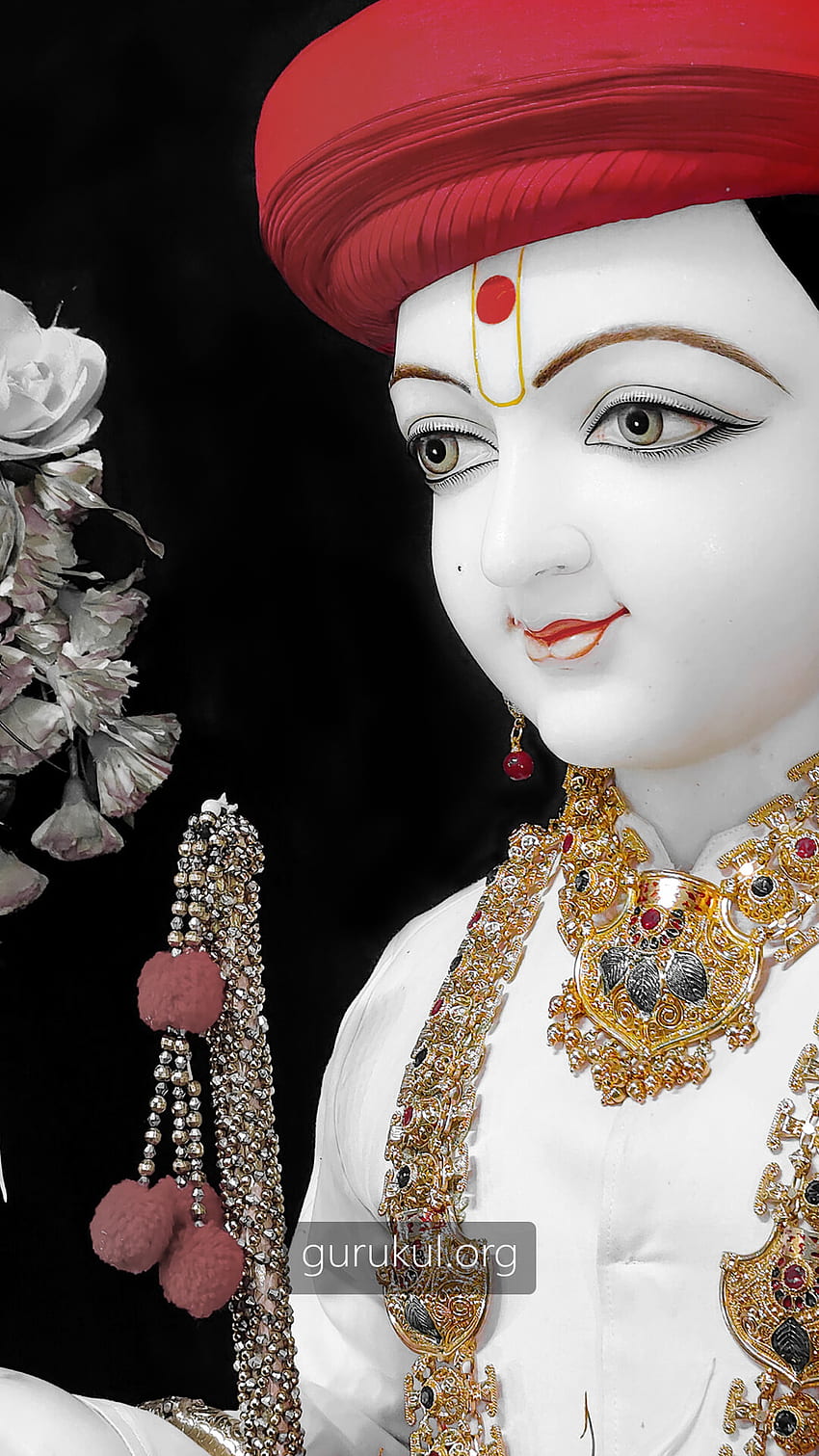 Swaminarayan deity with ornate jewelry