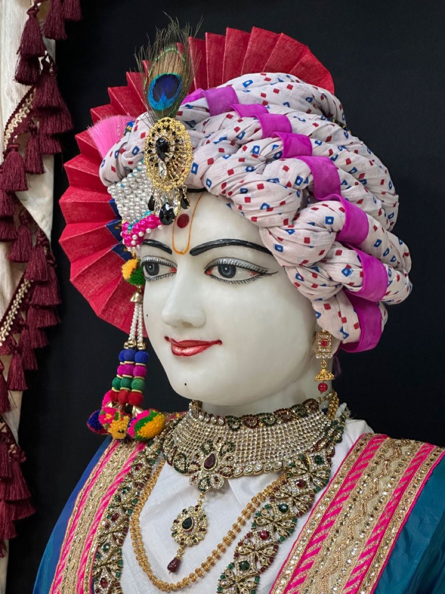 Swaminarayan with ornate turban and jewelry