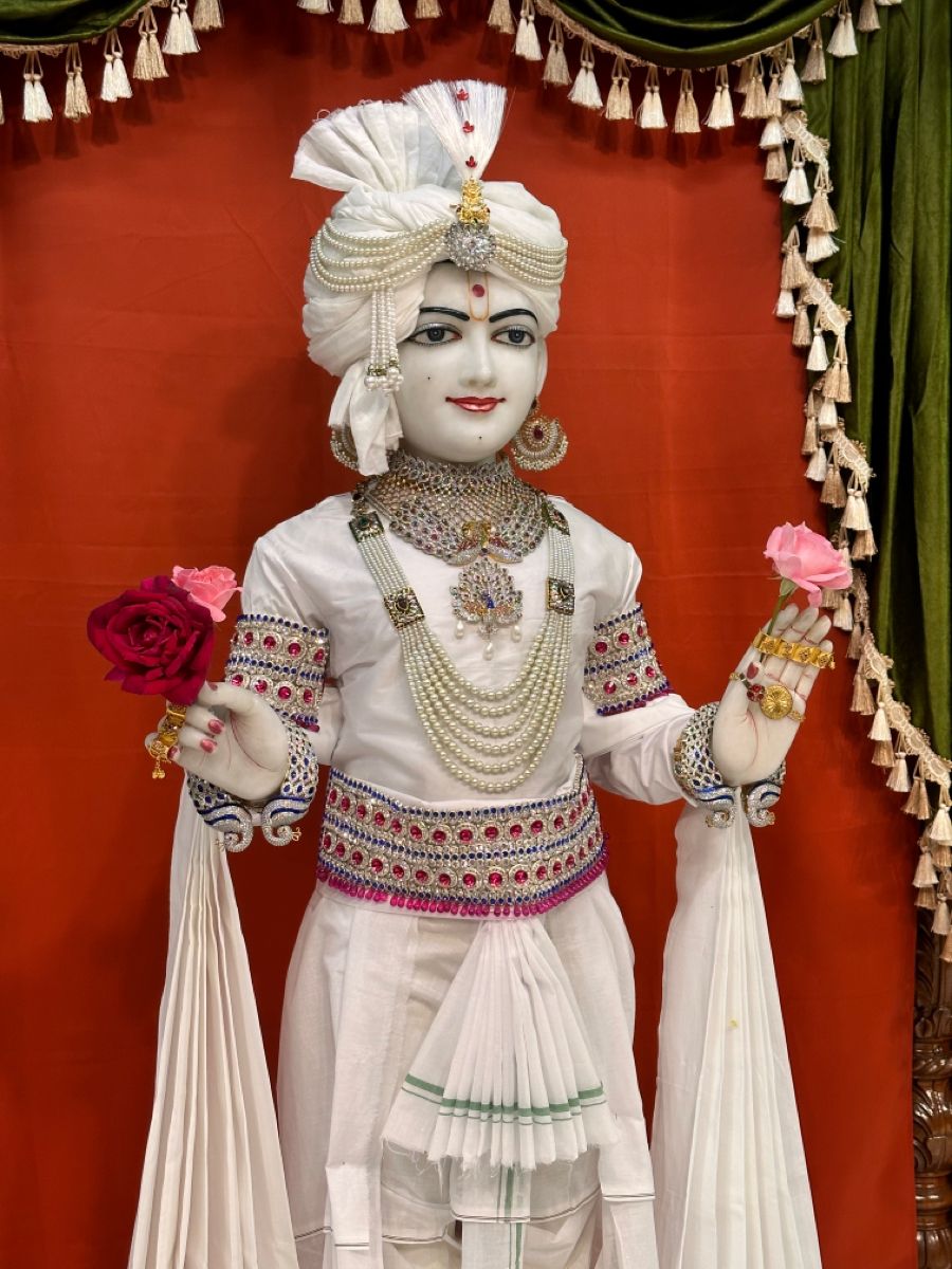 Swaminarayan Bhagwan with floral offerings