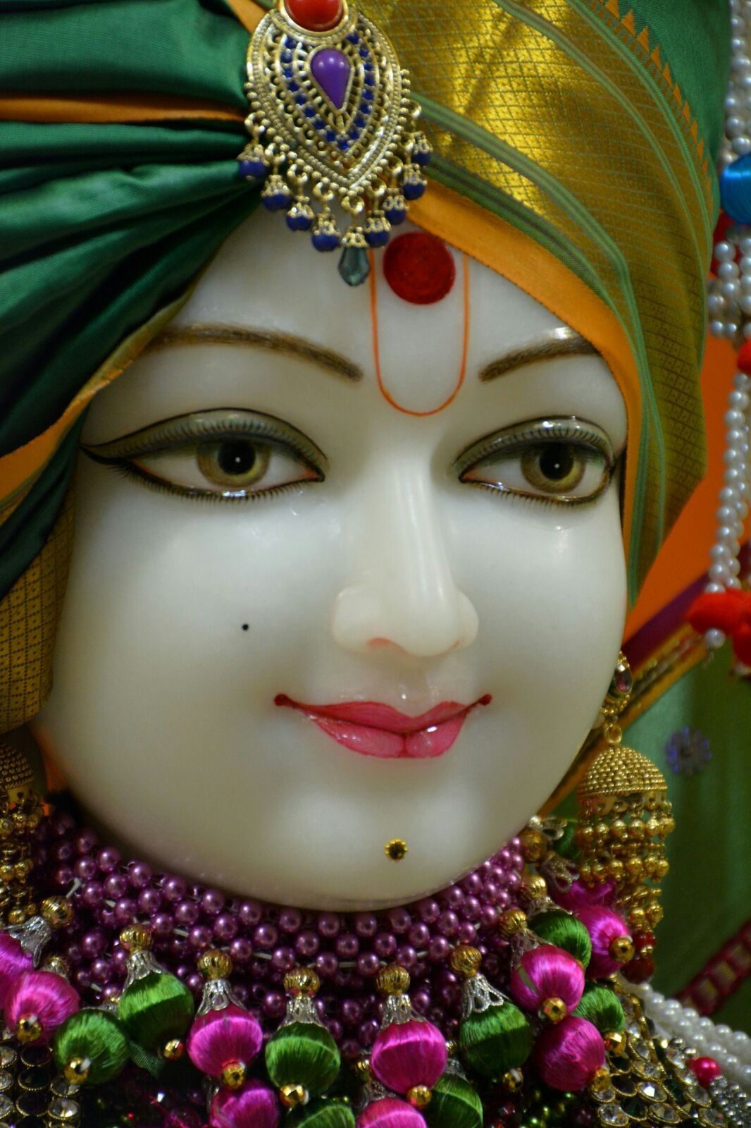 Close-up of Swaminarayan Bhagwan\'s serene face