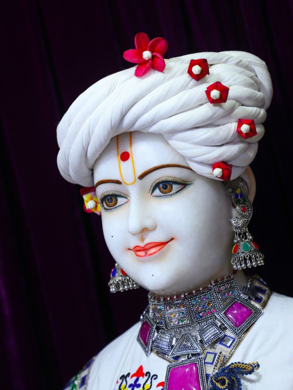 Swaminarayan with floral turban, serene face