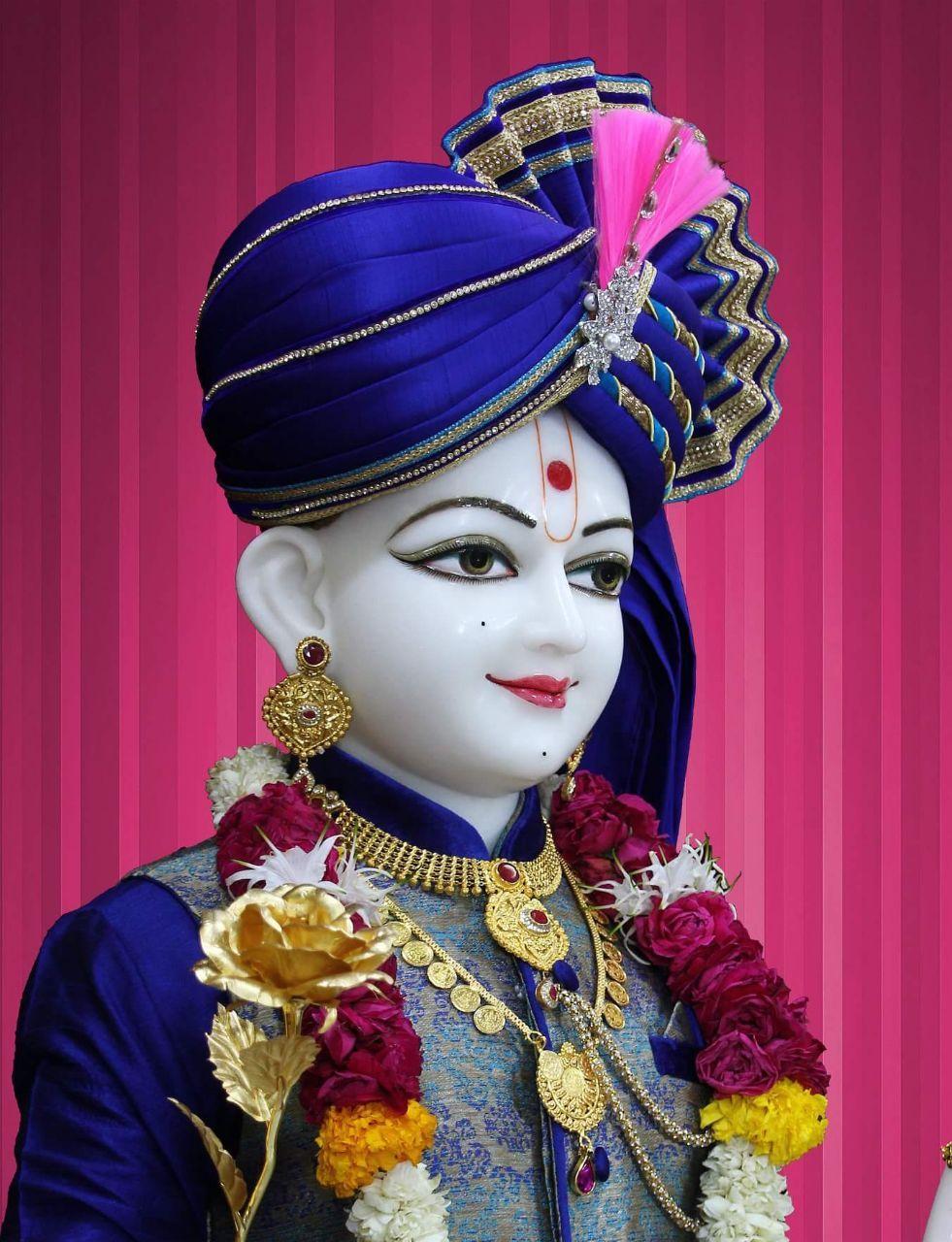 Swaminarayan with ornate turban and garland