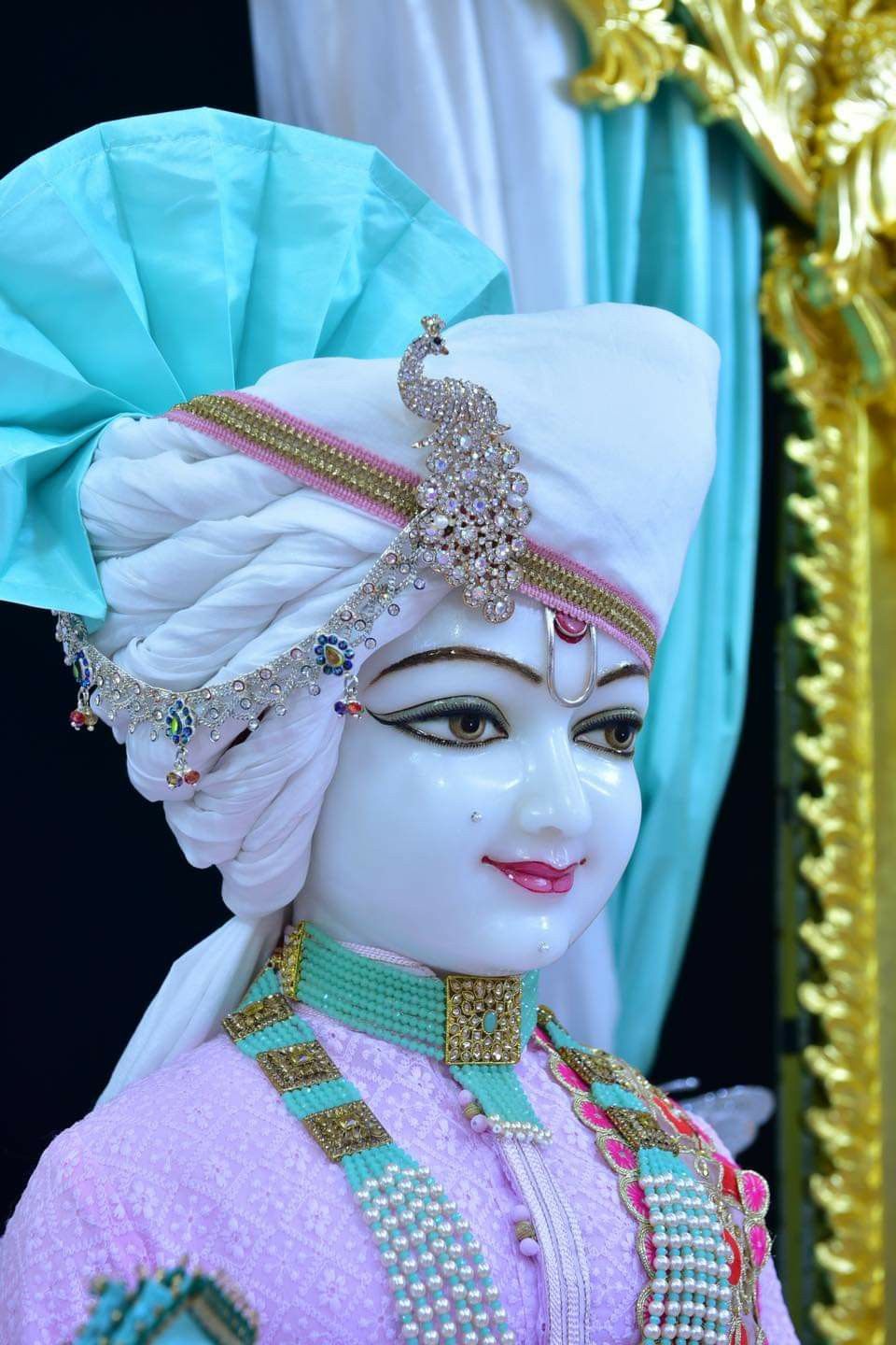 Divine Swaminarayan portrait with ornate jewels