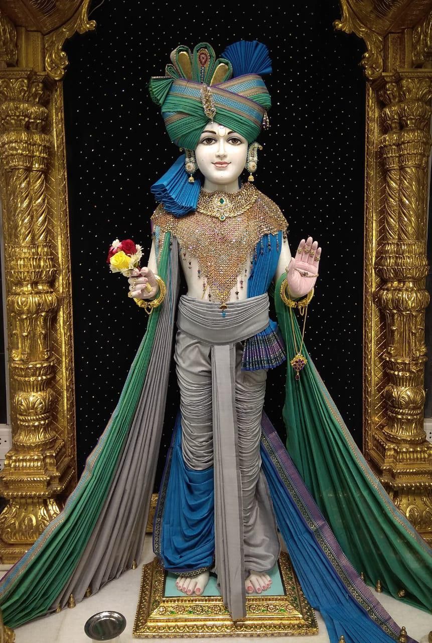 Swaminarayan Bhagwan in ornate temple setting