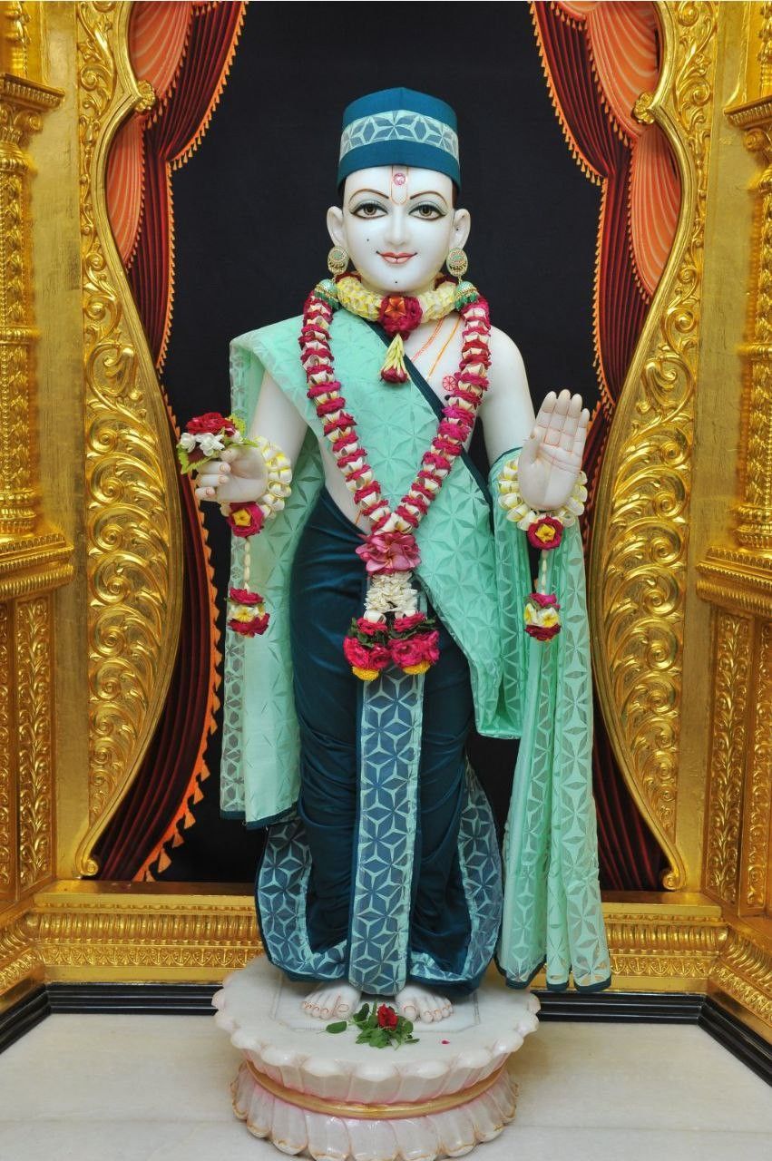 Shri Swaminarayan statue in temple setting