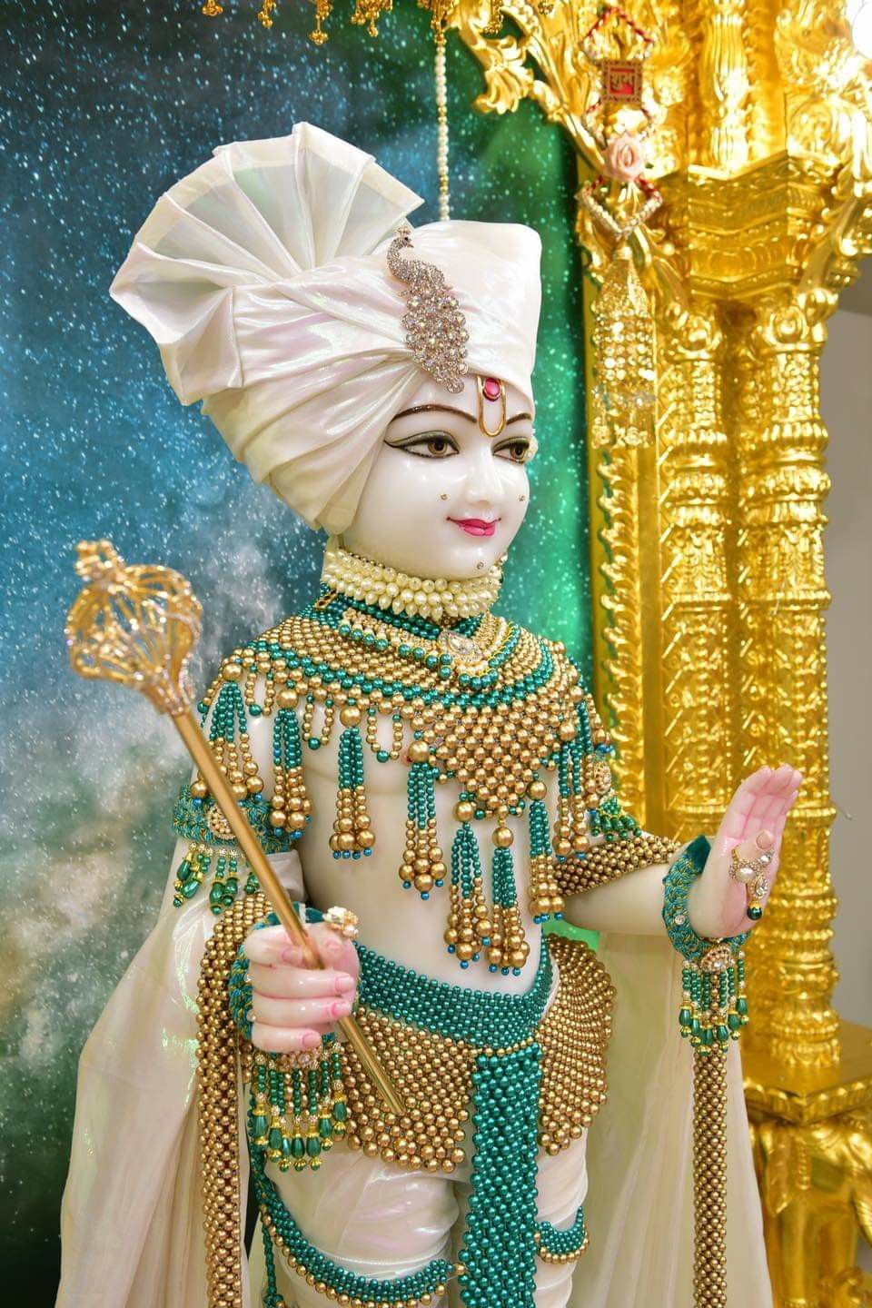 Swaminarayan Bhagwan adorned in gold jewelry