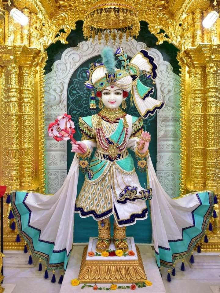 Swaminarayan Bhagwan in ornate temple setting