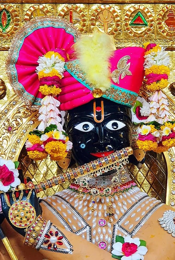 Swaminarayan Maharaj with floral decorations