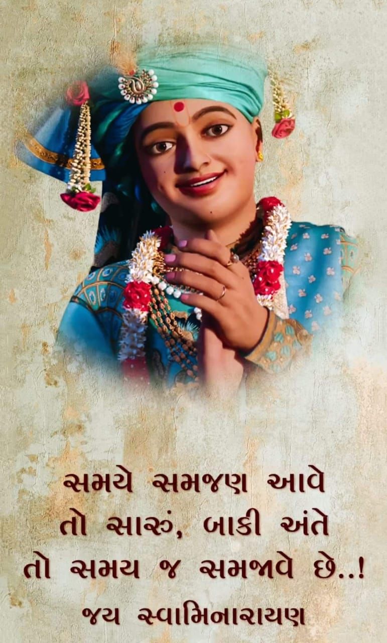 Swaminarayan in traditional attire looking serene