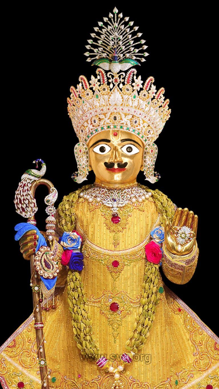 Golden Swaminarayan portrait with floral garland