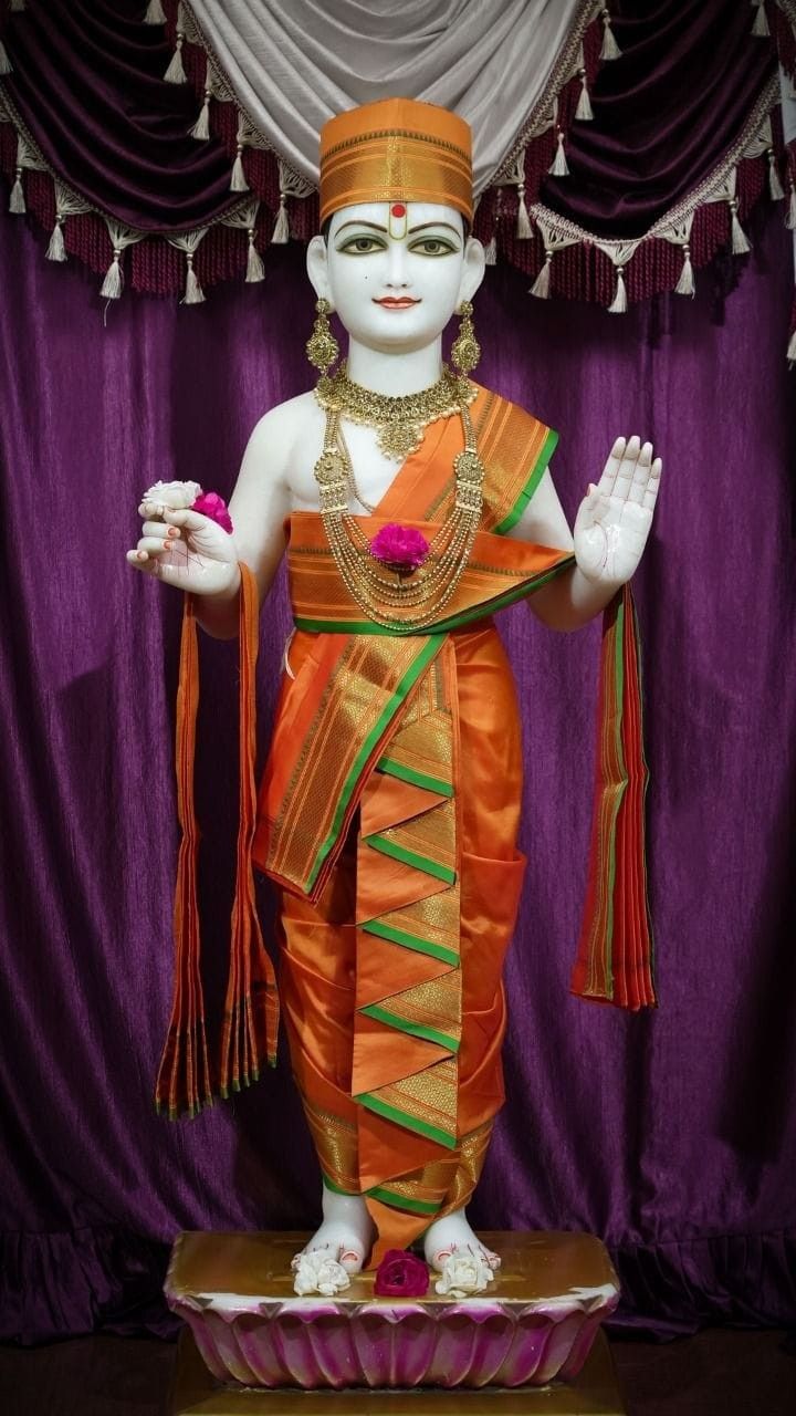Swaminarayan murti with blessing gesture