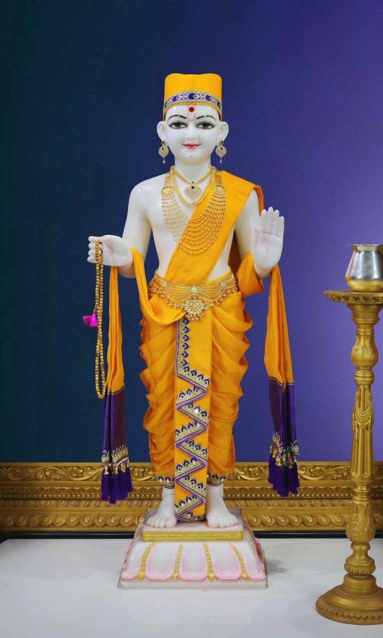 Swaminarayan statue in traditional attire