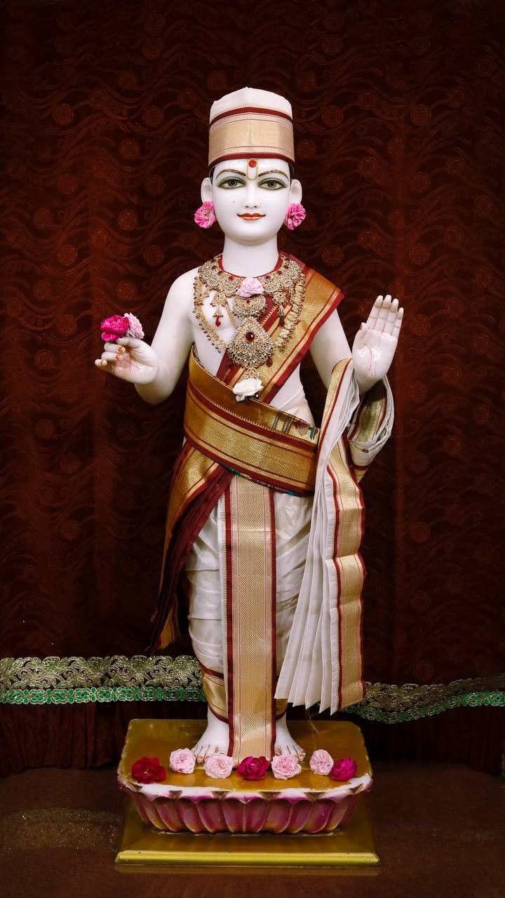 Swaminarayan bestowing blessings with open hand