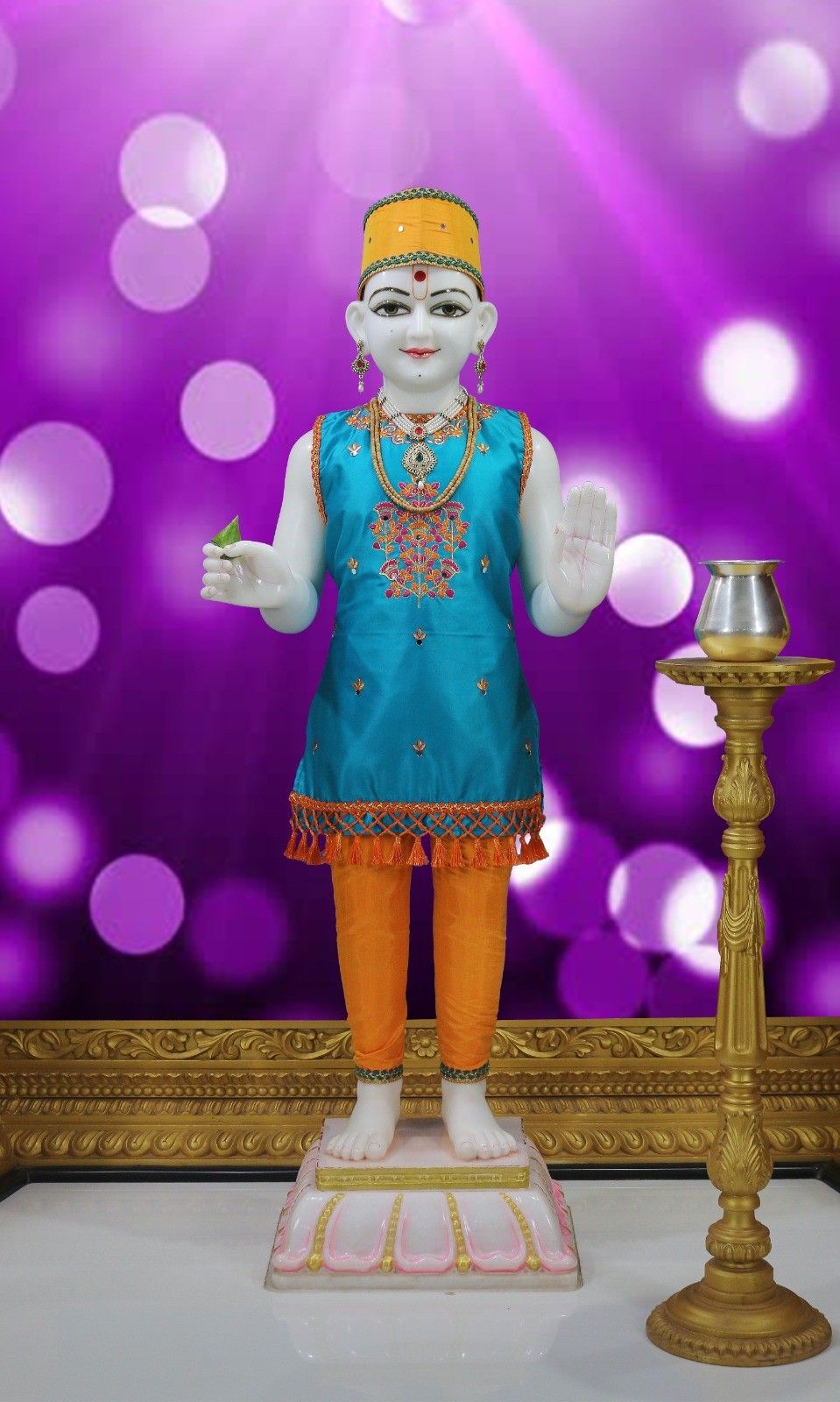 Swaminarayan statue in temple setting