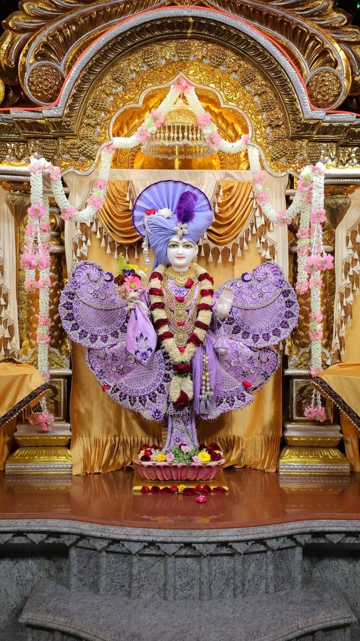 Swaminarayan seated on golden throne