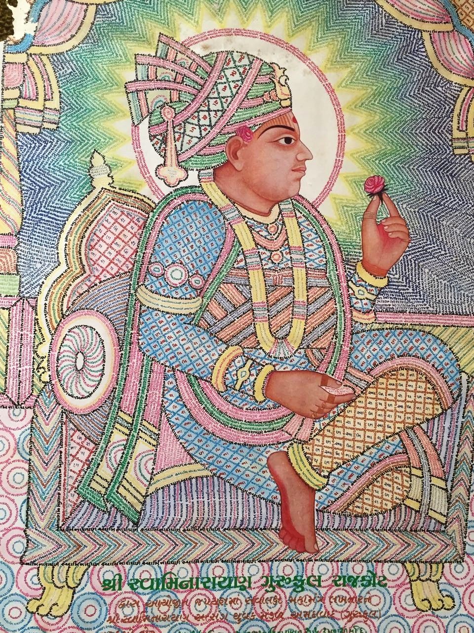 Swaminarayan in elaborate traditional attire