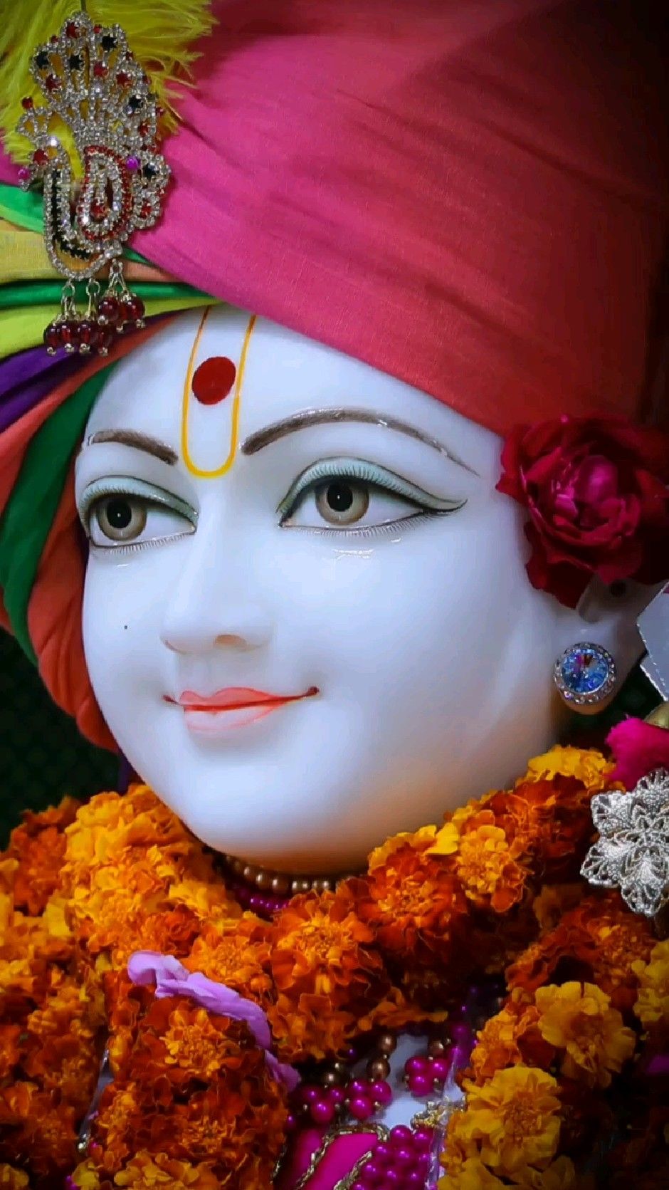 Swaminarayan with marigold flowers adornment